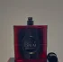Yves Saint Laurent Black Opium Eau de Parfum Over Red
