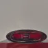 Yves Saint Laurent Black Opium Eau de Parfum Over Red