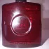 Yves Saint Laurent Black Opium Eau de Parfum Over Red