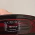 Yves Saint Laurent Black Opium Eau de Parfum Over Red