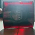 Yves Saint Laurent Black Opium Eau de Parfum Over Red
